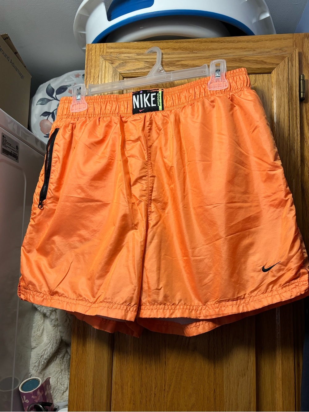 Nike Women’s Bright Orange Athletic Shorts with Black Accents